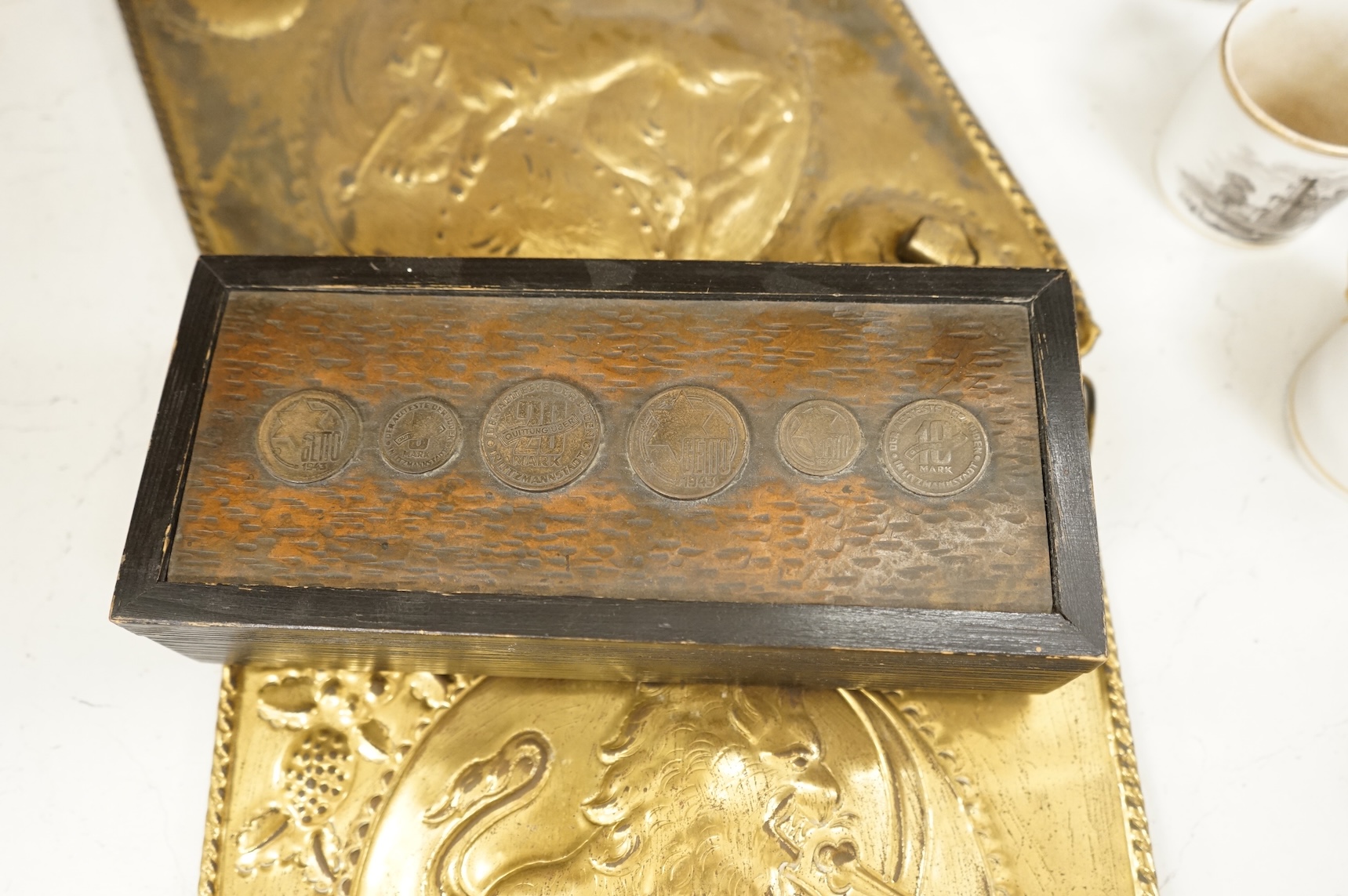 A Victorian glass spirit barrel, converted to a lamp base, together with a pair of embossed sheet-brass heraldic plaques and a replica coin set box